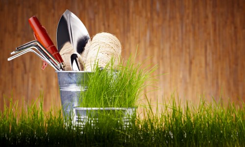 Team managing turf, soil, and planting materials during landscaping